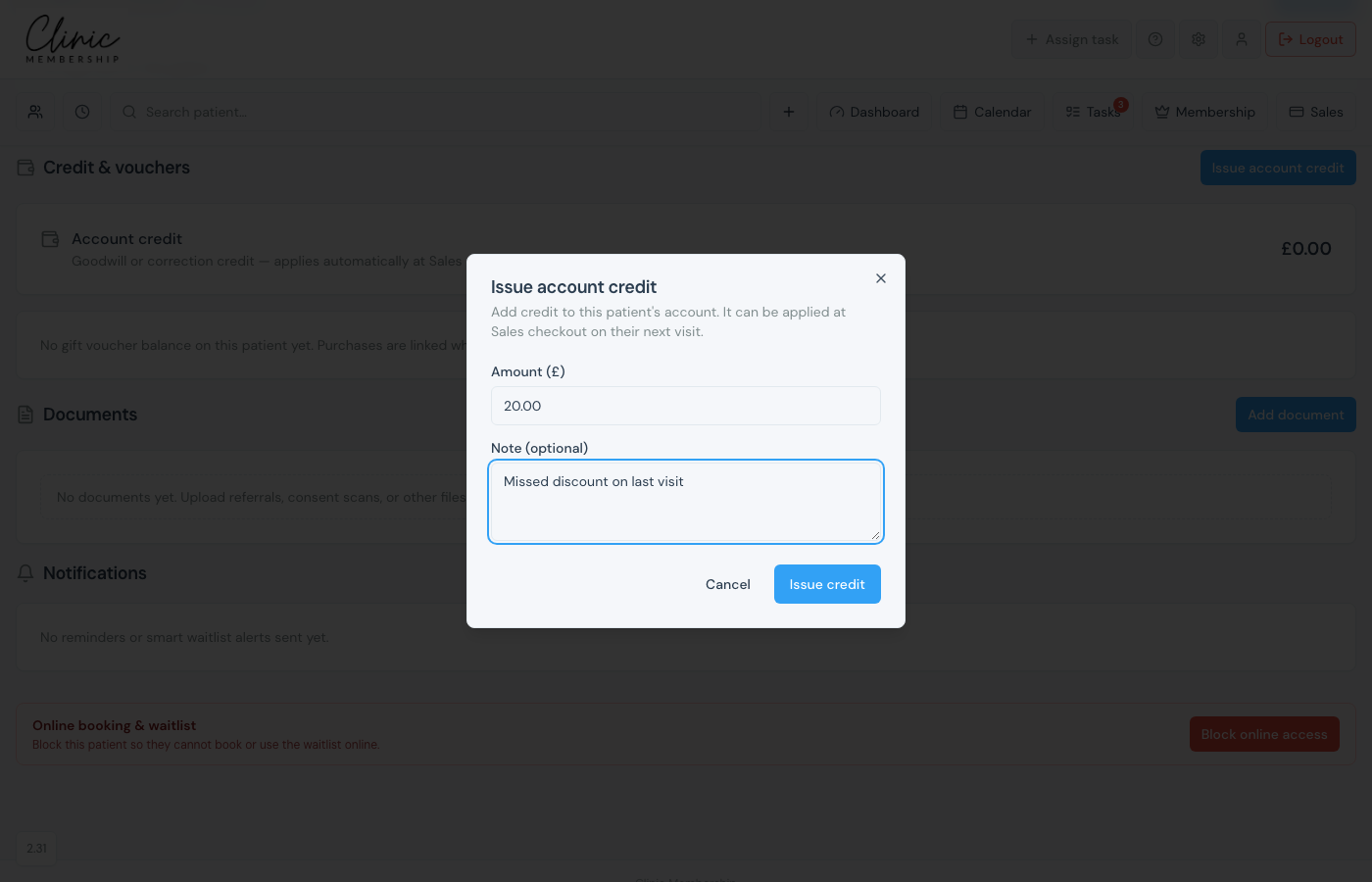 Issue account credit dialog with amount and optional note